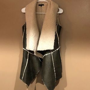 Sherpa and faux leather vest